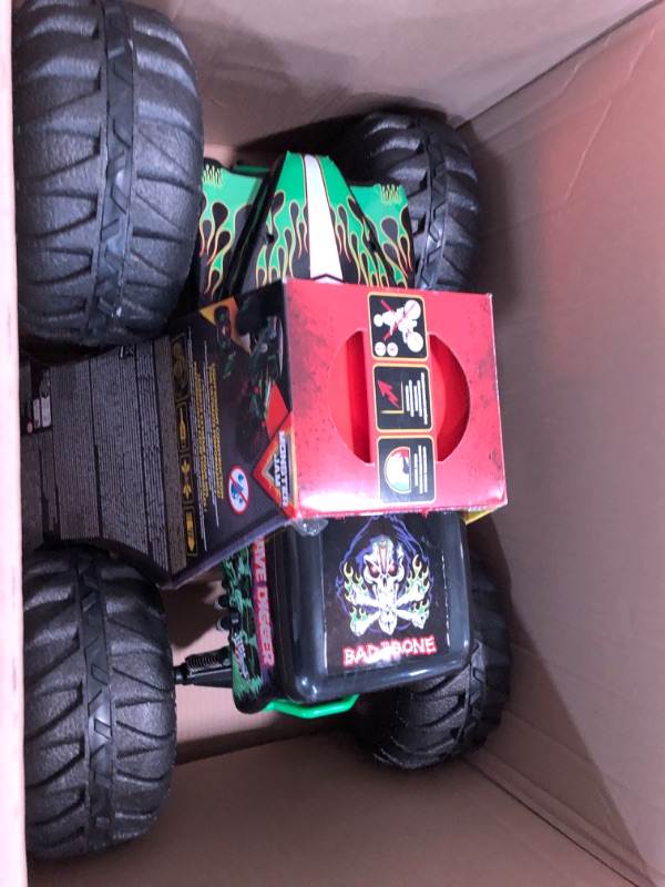 Photo 2 of Monster Jam, Official Mega Grave Digger All-Terrain Remote Control Monster Truck, Over 2 Ft. Tall, 1:6 Scale, Kids Toys for Boys and Girls Ages 4-6+