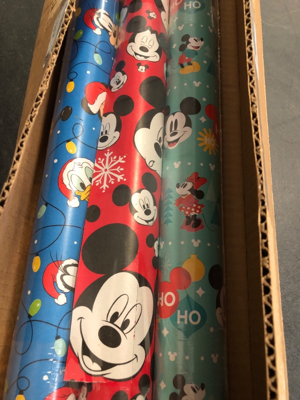 Photo 2 of American Greetings Disney Christmas Wrapping Paper with Cut Lines Bundle, Mickey Mouse (3 Rolls, 105 sq. ft.)