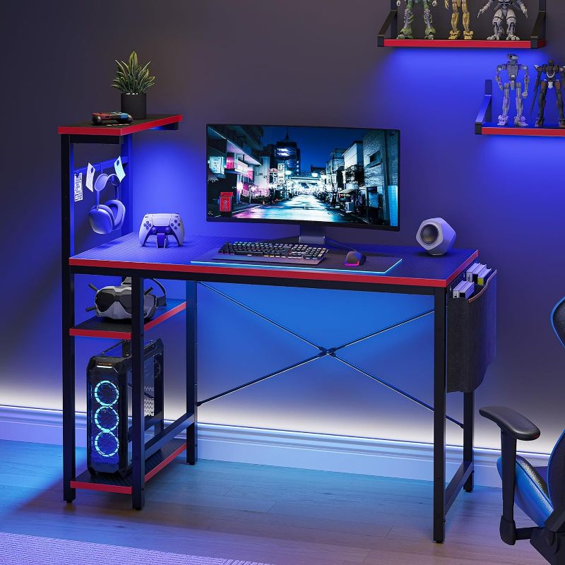 Photo 1 of Bestier Gaming Desk with LED Lights, 44 Inch PC Gamer Desk for Small Spaces, Computer Desk with Reversible Storage Shelves & Side Storage Bag (Black 3D Carbon Fiber)
