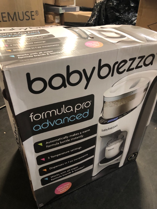 Photo 1 of New and Improved Baby Brezza Formula Pro Advanced Formula Dispenser Machine - Automatically Mix a Warm Formula Bottle Instantly - Easily Make Bottle with Automatic Powder Blending