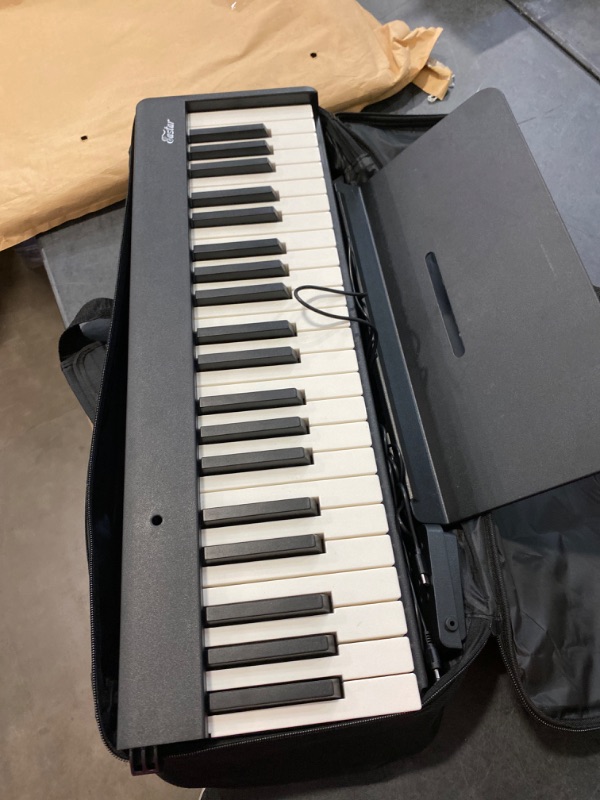 Photo 2 of Eastar EP-10 Beginner Foldable Digital Piano 88 Key Full Size Semi Weighted Keyboard, Bluetooth Portable Electric Piano with Piano Bag
