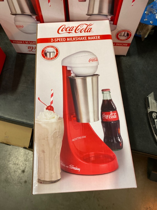 Photo 2 of Nostalgia Two-Speed Electric Coca-Cola Limited Edition Milkshake Maker and Drink Mixer, Includes 16-Ounce Stainless Steel Mixing Cup and Rod, Red Coke