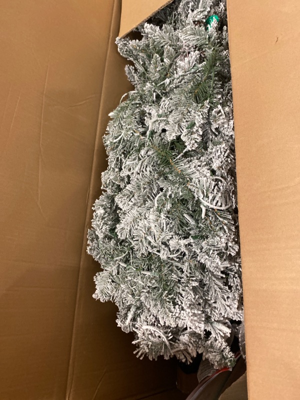 Photo 2 of Puleo International 7.5 Foot Pre-Lit Slim Flocked Fraser Fir Artificial Christmas Tree with 500 UL Listed Clear Lights 7.5' Slim Flocked Fraser Fir with 500 Clear Lights Christmas Tree