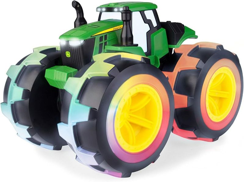 Photo 1 of Monster Treads Lightning Wheels Light Up Tractor Deluxe - John Deere Tractor Toys - Light Up Monster Truck Tractor with Rainbow Lights and Sounds Medium