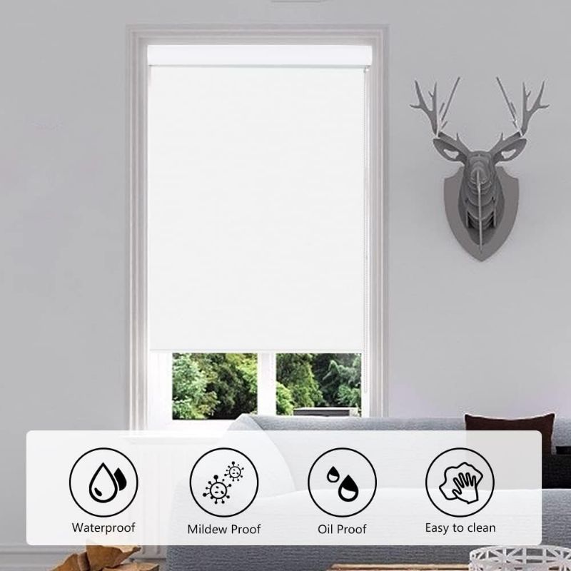 Photo 1 of KCO Blackout Roller Shade Blinds for Windows with Valance Cover, Roller Window Shade UV Protection Waterproof Fabric for Home, Bedroom, Door Windows, 28" W x 72" L, White