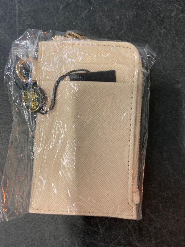 Photo 1 of Lionel Handbags and Accessories Cream Wristlet Wallet