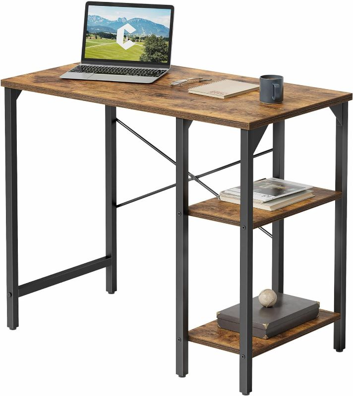 Photo 1 of CubiCubi Small Computer Desk, 35 Inch Home Office Desk with 2 Storage Shelves on Left or Right Side, Study Writing Desk with Storage Board, Rustic Brown
