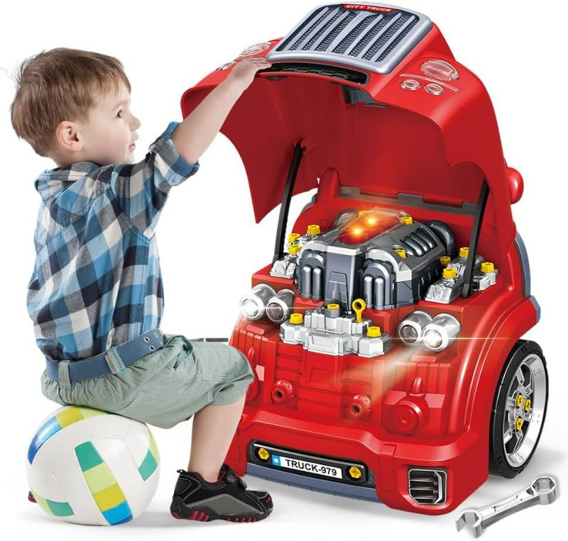 Photo 1 of .Interactive Truck Engine Toy with Removable Parts - Lights, Sounds, and Fun for Young Mechanics