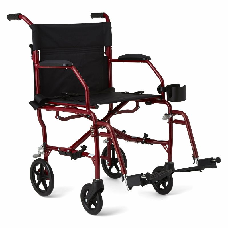 Photo 1 of Medline Ultralight Transport Wheelchair with 19” Wide Seat, Folding Transport Chair with Permanent Desk-Length Arms, Red Frame NEW