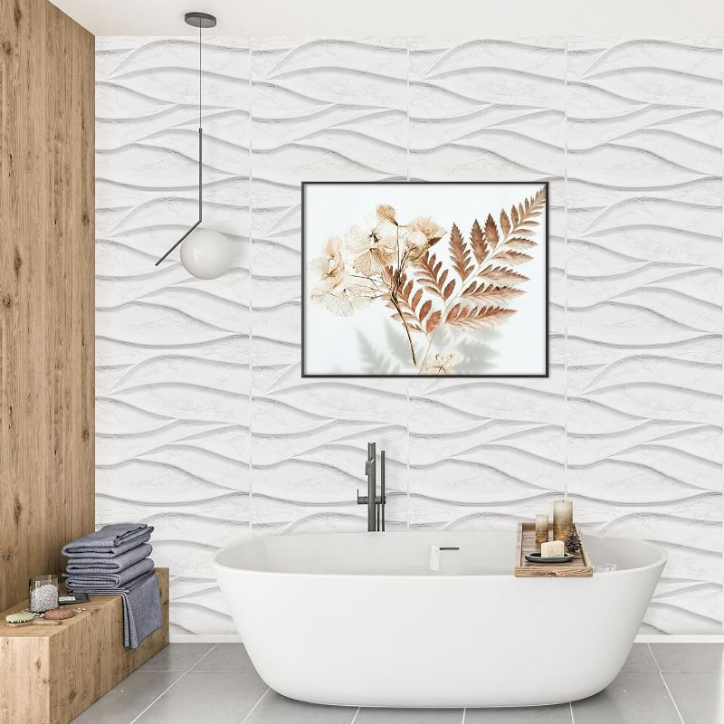 Photo 2 of STICKGOO 3D Wall Panels for Interior Wall Decor, PVC Wave Wall Tiles Design Comes with a Roll of Peel and Stick Tape, Decorative Wall Panels Peel and Stick, Pack of 12 Tiles 32.34 sq. Ft
