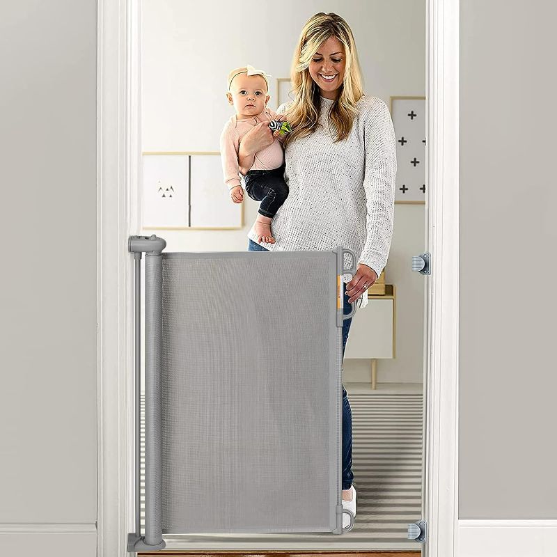 Photo 1 of Momcozy Retractable Baby Gate, 33" Tall, Extends up to 55" Wide, Child Safety Baby Gates for Stairs, Doorways, Hallways, Indoor, Outdoor
