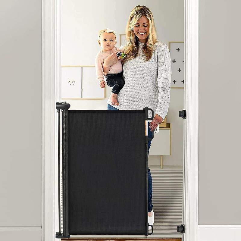 Photo 1 of Retractable Baby Gate, Momcozy Extra Wide Mesh Baby Gates for Stairs, 33" Tall, Extends to 71" Wide, Pet Dog Gate for Doorways, Stairs, Hallways, Indoor/Outdoor
