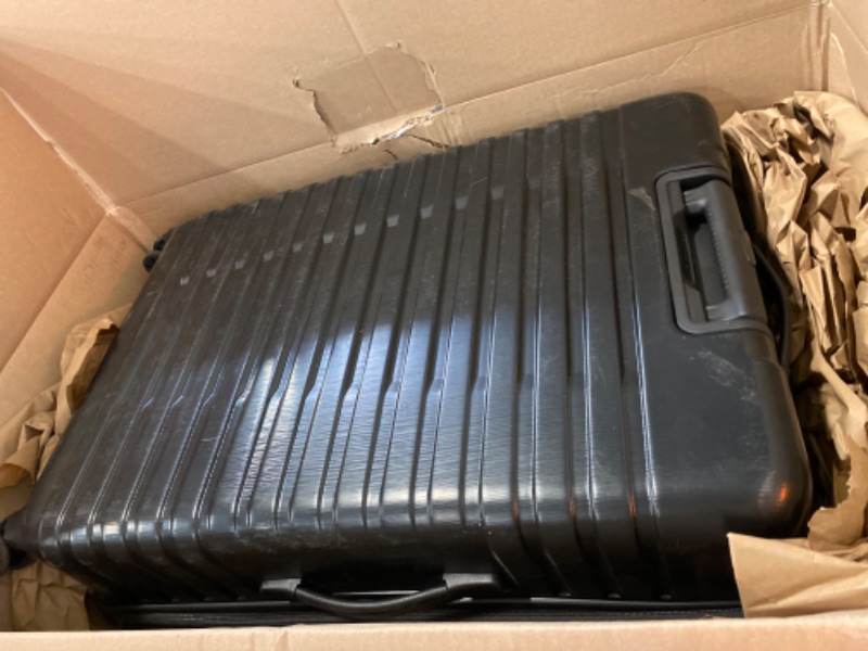 Photo 1 of U.S. Traveler Boren Polycarbonate Hardside Rugged Travel Suitcase Luggage with 8 Spinner Wheels, Aluminum Handle, Black, Checked-Large 30-Inch
