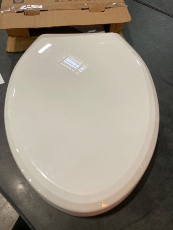 Photo 3 of Delta Faucet 813902-N-WH Sanborne Elongated Nightlight Toilet Seat with Slow Close and Quick-Release, White
