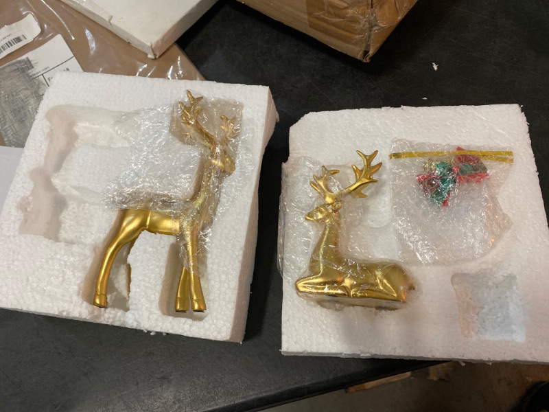 Photo 3 of FANTESTICRYAN 2pcs Reindeer Sculpture Gold Resin Christmas Elk Statues Home Office Decorative Displays for Living Room, Bedroom, Bathroom, Bookshelf, Desktop, Cabinets (Golden Large)
