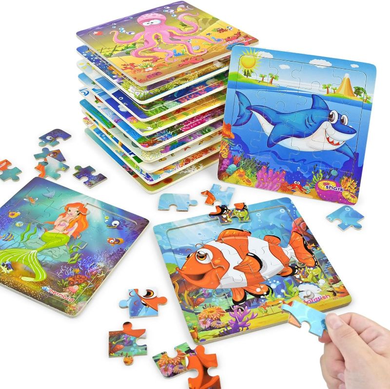 Photo 1 of Vileafy 12Pack Wooden Jigsaw Puzzles Party Favors for Kids Age 4-8 Years Old, Sea Animals Small Toddler Puzzles - Gifts and Travel Puzzles 20 Pieces Per Puzzle with Organza Bags
