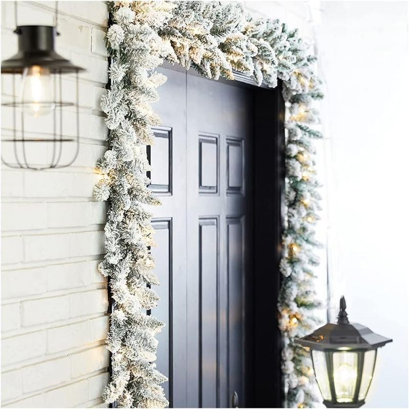 Photo 1 of Glitzhome 2PK Pre-Lit Snow Flocked Christmas Garland with Warm White LED Light
