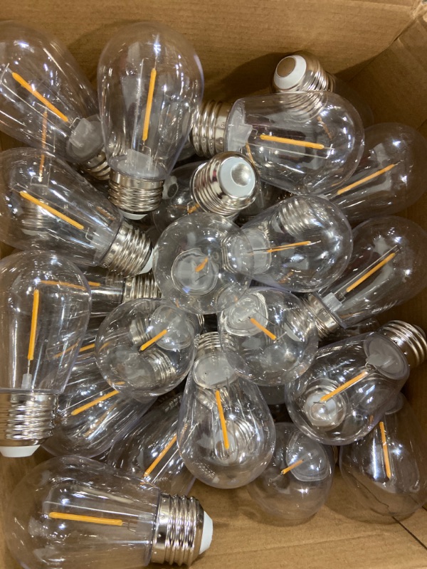 Photo 2 of S14 LED Replacement Light Bulbs Shatterproof Waterproof String Light Replacement Bulb 1w Outdoor LED Bulb Vintage Patio Light Bulb E26 Base 110v Plastic LED Filament Clear Bulb (Warm White, 100 Pcs)