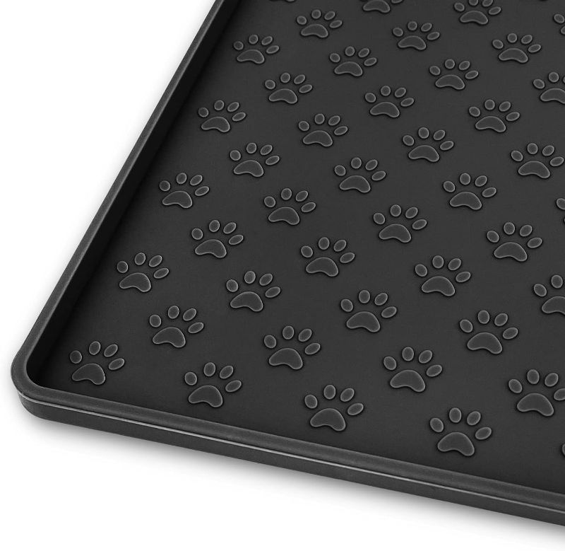 Photo 1 of Ptlom Silicone Pet Placemat for Dog and Cat, Waterproof Anti-Slip Pet Feeding Bowl Mats for Food and Water, Small Medium Large Tray Mat Prevent Residues from Spilling to Floor, Black, 31.5" 23.6"