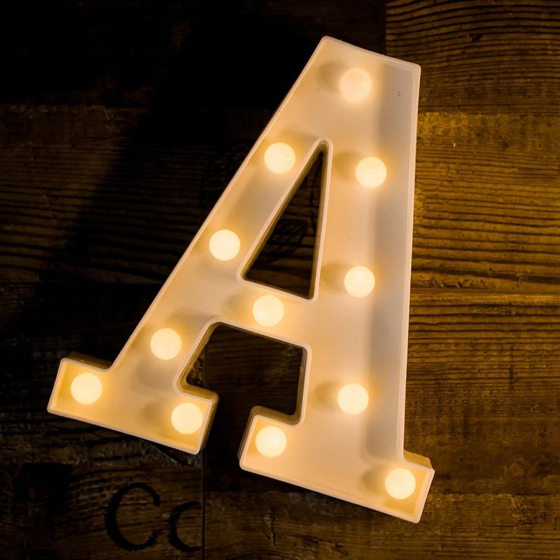 Photo 1 of Miscellaneous Bundle: Foaky LED Letter Lights Sign Marquee Light Up Letters Sign for Night Light Wedding/Birthday Party Battery Powered Christmas Lamp Home Bar Decoration(A) + Superhero Birthday Party Decorations, 40 Pack Superhero Theme Party Supplies In