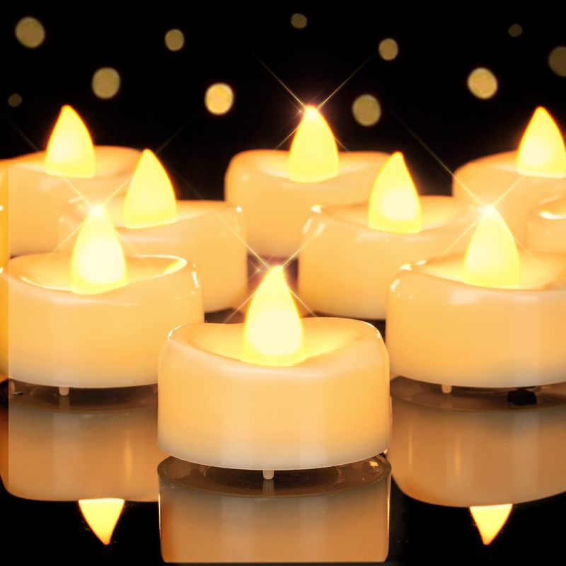 Photo 1 of YOJACIKI Flameless Candles, 50-Pack LED Tea Lights Candles, Battery Operated Candles Flickering, Last 200+ Hrs Fake Tealight Candles,Votive Candles for Halloween Christmas Weddings D 1.5”x H 1.25”