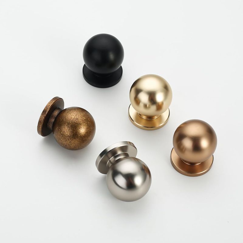 Photo 2 of Coinkoly 10 Pack Brushed Gold Kitchen 1Inch(27mm) Cabinet Knobs Single Hole Dresser Knobs Cabinet Door Handles and Pulls Knobs for Cabinets and Drawers Kitchen Cabinet Hardware
