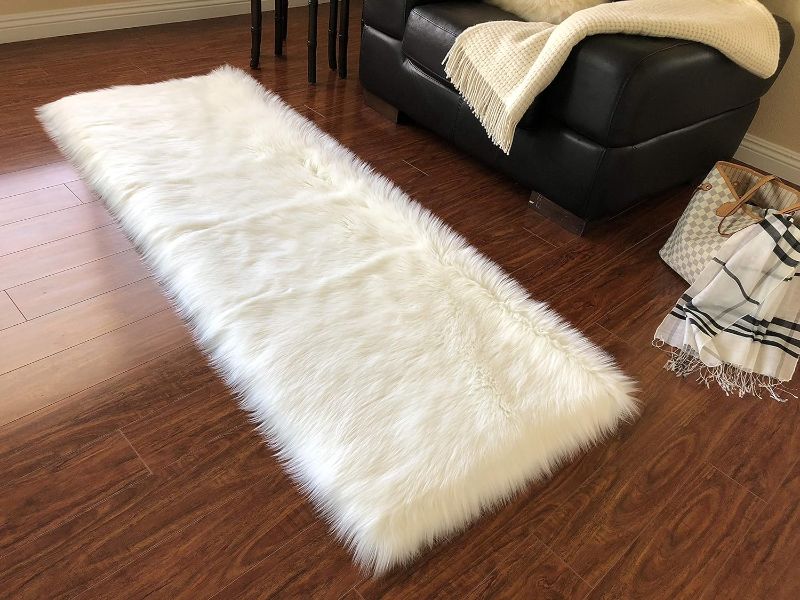 Photo 1 of LAMBZY Faux Sheepskin Super Soft Hypoallergenic Rectangular Area Rug Plush Fur, Luxury Shaggy Silky Carpet for Bedrooms Rugs Living Room Kids Rooms Sofa Floor (2'6"x6',75x180 cm,White)
