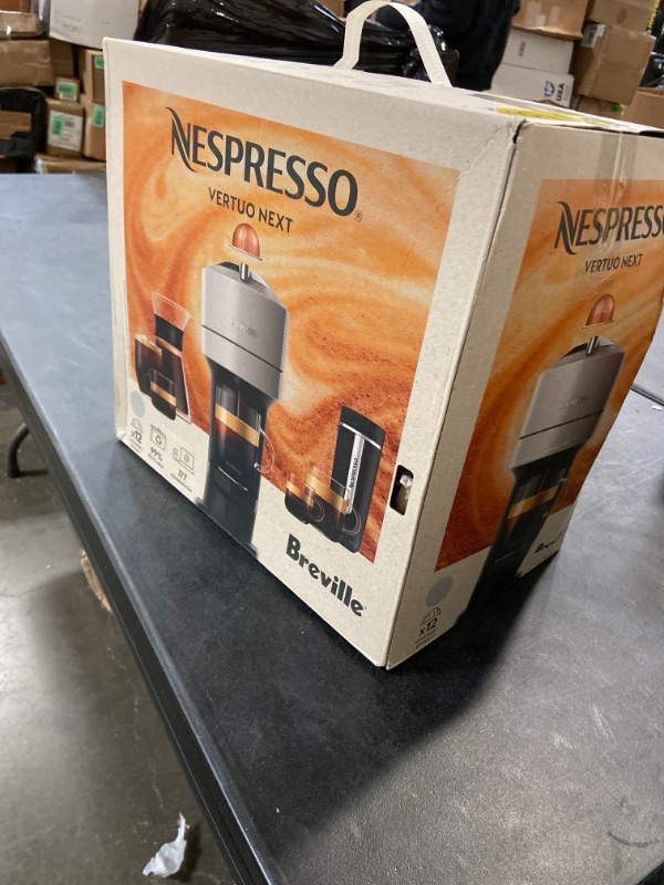 Photo 2 of Nespresso Vertuo Next Deluxe Coffee and Espresso Maker, Pure Chrome with Aeroccino Milk Frother,1.1 liter, Black,Dark Chrome

