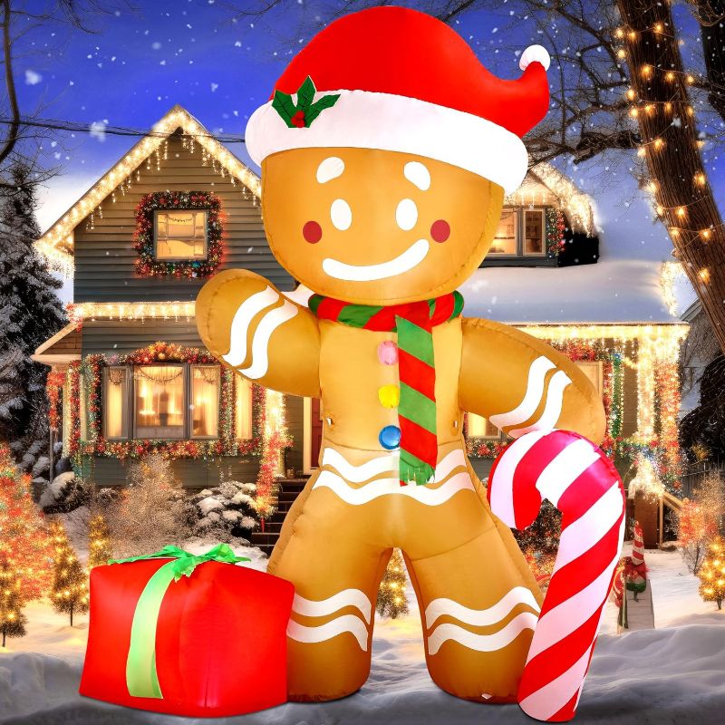 Photo 1 of Joiedomi 8 FT Christmas Inflatable Gingerbread Man with Candy Cane, Blow Up Inflatable Yard Decoration with Build-in LEDs Inflatable for Christmas, Party Indoor, Outdoor, Yard, Garden, Lawn Décor
