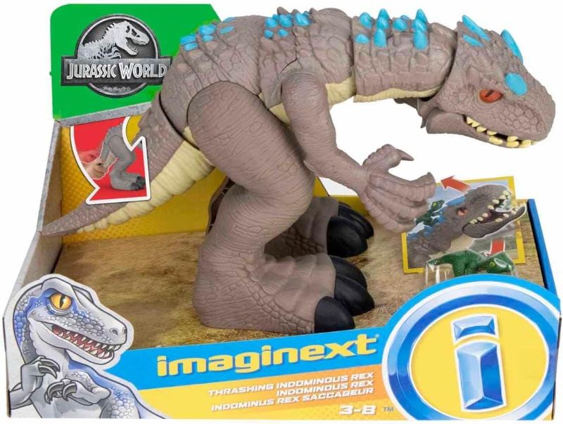 Photo 1 of Fisher-Price Jurassic World Toys Jurassic World Indominus Rex Dinosaur Toy with Thrashing Action & Raptor Figure for Pretend Play Ages 3+ Years