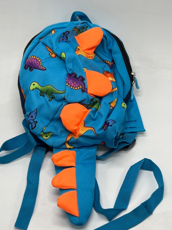 Photo 1 of Blue Dinosaur Tail Toddler Leash Backpack
