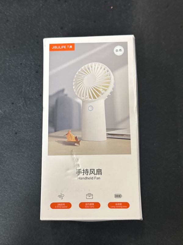 Photo 2 of JISULIFE Handheld Fan, 4000mAh Portable Hand Fan, Mini Personal Rechargeable Hand Held Fan, Max 16Hrs Battery Operated USB Small Fan with 3 Speeds for Outdoor Travel Commute Office Women Men-White