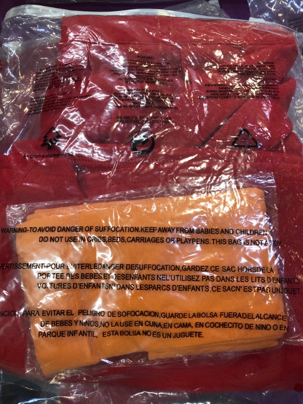 Photo 1 of WOMENS RED SKIRT SIZE LARGE, POSSIBLY FOR KIDS, SMALL ADULTS. ITEM LOOKS VERY SMALL FOR A LARGE.