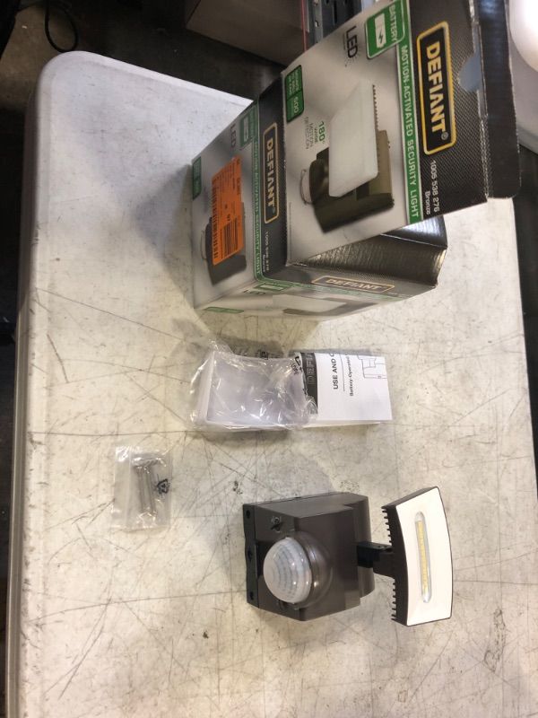 Photo 1 of NEW! Defiant 180-Degree Battery Motion Sensor Outdoor LED Flood Light-500 Lumens

