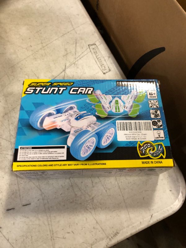 Photo 1 of Alkinoos Stunt Drift Car, Remote Control Car with Two Modes and 4-Wheel Drive, RC Car with Gesture Sensing, 360-Degree Flips, Music and Lights - Blue 1:12 Stunt Drift Car Blue