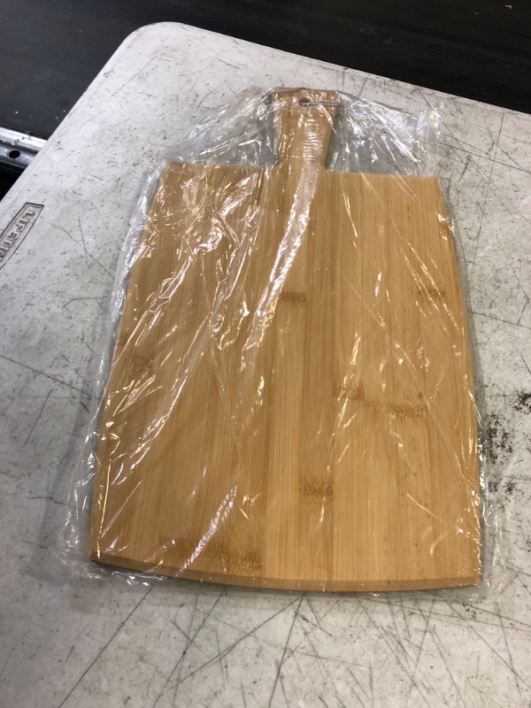 Photo 1 of 7x10 CUTTING BOARD WITH HANDLE 