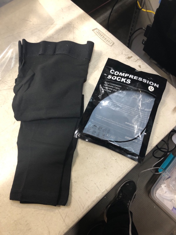 Photo 1 of BLACK COMPRESSION SOCKS 