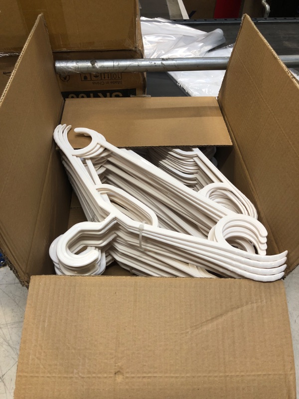 Photo 1 of 50 PC WHITE HANGERS 