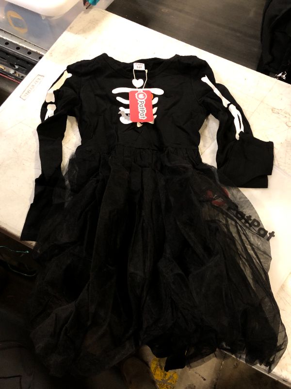 Photo 1 of GIRLS HALLOWEEN DRESS BLACK SKELETON 8-9 YR OLD