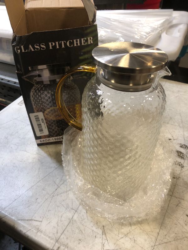 Photo 1 of PARACITY Glass Pitcher with Lid, Hot& Cold Glass Water Pitcher with Handle, Iced Tea Pitcher Carafe for Coffee, Juice, Lemonade and Milk 61oz/ 1.8
