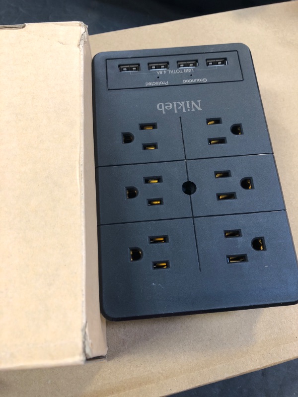 Photo 1 of Multiple Plug Outlet Extender Nikleb, Surge Protector 12 Outlets, Plug Extender with 4 USB Ports Shared 4.8A, Wall Outlet Covers with Phone Holder, Charger Block Low Profile, USB Plug Space Saved Black