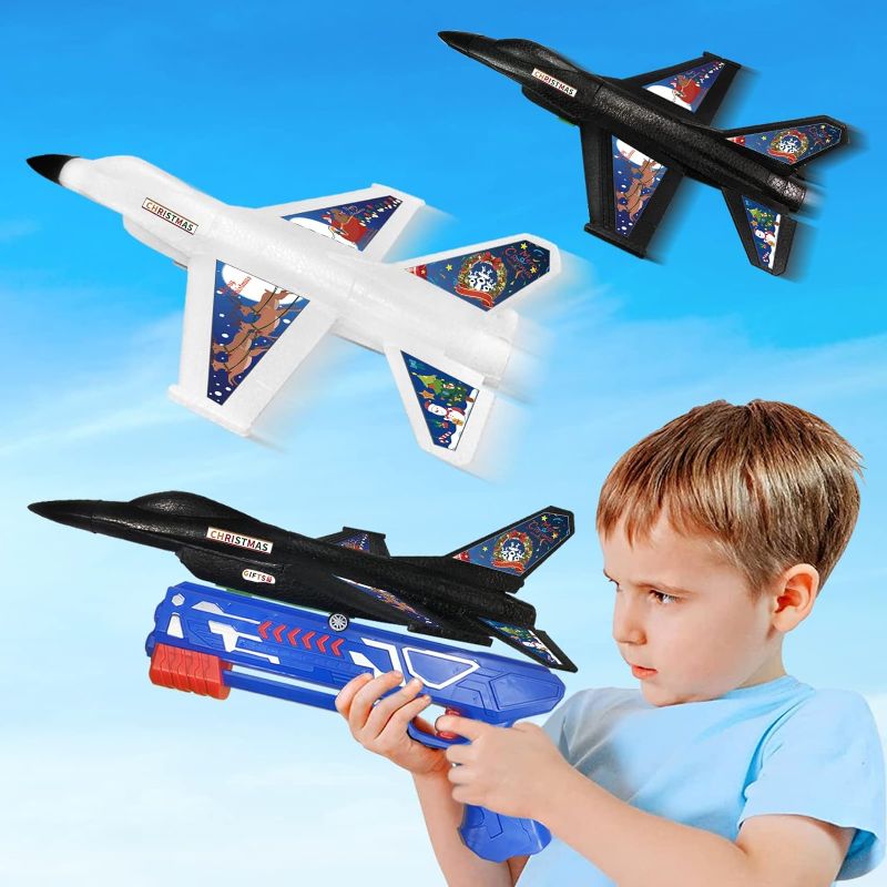 Photo 1 of 2 Pack Airplane Launcher Toy, Foam Glider Outdoor Flying Kids Toys Birthday Gifts for Age 4 5 6 7 8 9 10 12 Year Old Boys Girls, 13.3" Jet F-16 Fighting Plane Include 2 Set of Stickers (Christmas)
