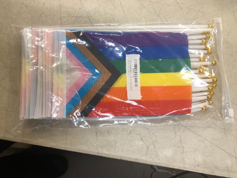Photo 2 of WXTWK 30 Pack Pride Rainbow Flags Set Gay LGBT Small Mini Hand Held Stick Flag Festival Party Parades Decorations(10 Rainbow Patterns, 3 Packs Of Each)