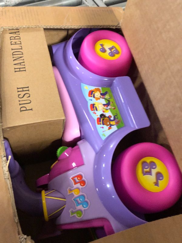 Photo 3 of Fisher Price Music Parade Purple Ride-On with 5 Different Marching Tunes! [Amazon Exclusive]