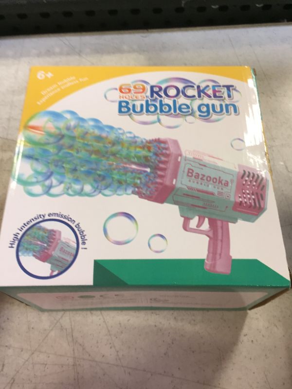 Photo 2 of Bazooka Bubble Machine Gun - 69 Hole Bubble Gun, Bubble Blower with Colorful Lights, Toys for Kids Adults, Party Favors Outdoor Pool Toys (Pink)
