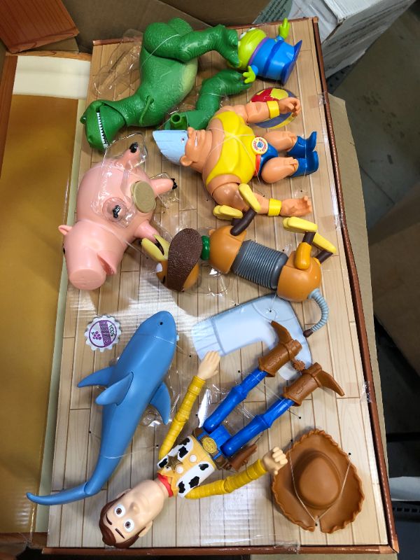 Photo 2 of Disney and Pixar Toy Story Set of 7 Action Figures with Woody, Slinky, Rex, Hamm, Alien, Rocky & Shark, Disney100 Collectible [Amazon Exclusive]