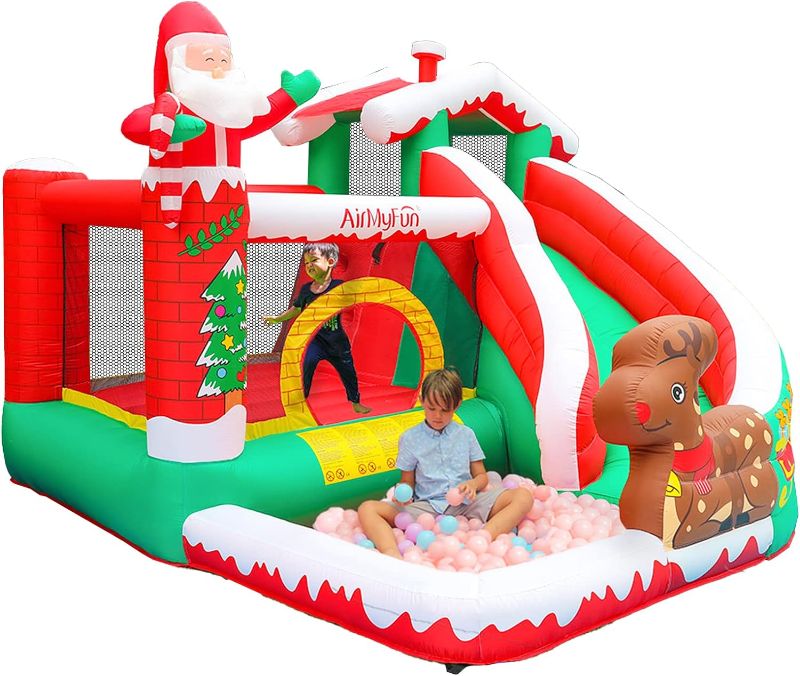 Photo 1 of AirMyFun Inflatable Christmas Bounce House with Slide Inflatable Santa Claus Snow House Bouncy House for Kids Outdoor Party with Air Blower
