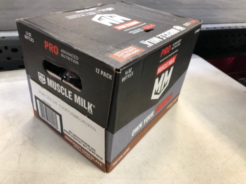 Photo 1 of Exp date 06/2024--Muscle Milk Pro Advanced Nutrition Protein Shake, Knockout Chocolate, 14 Fl Oz Bottle, 12 Pack, 40g Protein, 1g Sugar, 16 Vitamins & Minerals, 6g Fiber, Workout Recovery, Packaging May Vary Chocolate 14 Fl Oz (Pack of 12)