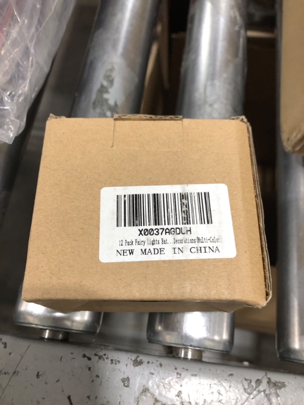 Photo 1 of VOOKRY 12 Pack Fairy Lights Battery Operated, 30 LEDs Mini Starry String Lights 9.8ft Silvery Copper Wire Lights,Works for Wedding Centerpiece,Party,Gifts,Table, Christmas Decorations(Multi-Colored) 12 Pack Mix Color