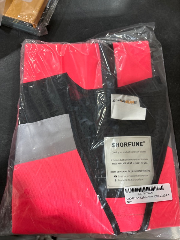 Photo 1 of High Visibility Safety Vest with Pockets, Mic Tab, Reflective Strips and Zipper, ANSI/ISEA Standards Large Polyester Fabric & 6 Pockets Pink
